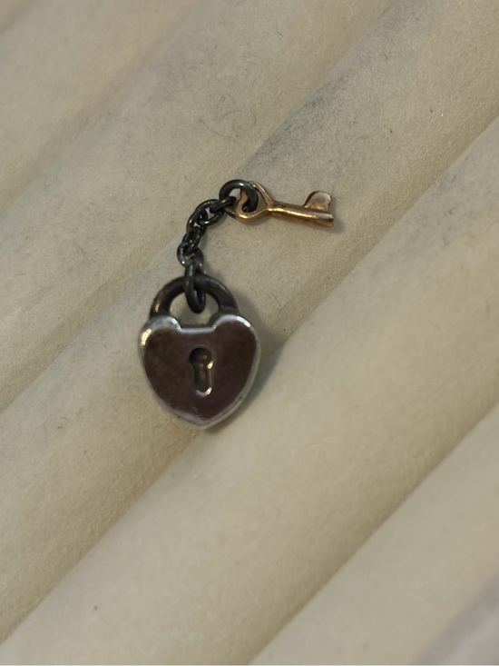 Pandora Jewelry - retired,authentic two-tone Pandora charm known as Key to My Heart Padlock Charm